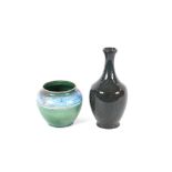 A Green glazed Studio pottery baluster vase, 20cm;