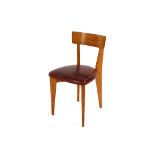 A set of six 1950's French light oak bar back dining chairs