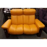 An Ekornes collection Stressless two seater sofa, high back, upholstered in Clementine leather