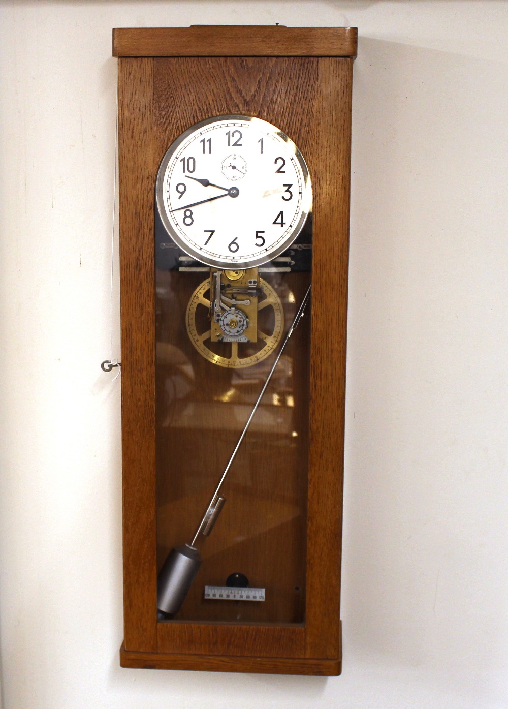 A light oak cased Master clock