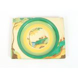 A Clarice Cliff "Biarritz" plate with house and fl