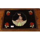 A decorative two handled tray, having glass panel decorated crinoline lady and roses