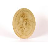 An Art Nouveau alabaster plaque, decorated with dancing maiden and cherub
