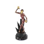 An Art Deco painted spelter figure, of a girl juggling balls, on unusual stylised base, 32cm high