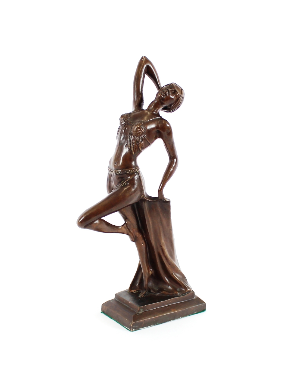 A bronzed Art Deco style figure of a dancing girl, 45cm high