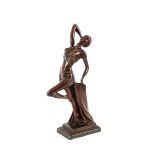 A bronzed Art Deco style figure of a dancing girl, 45cm high