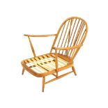 A light Ercol stick back deep seated armchair