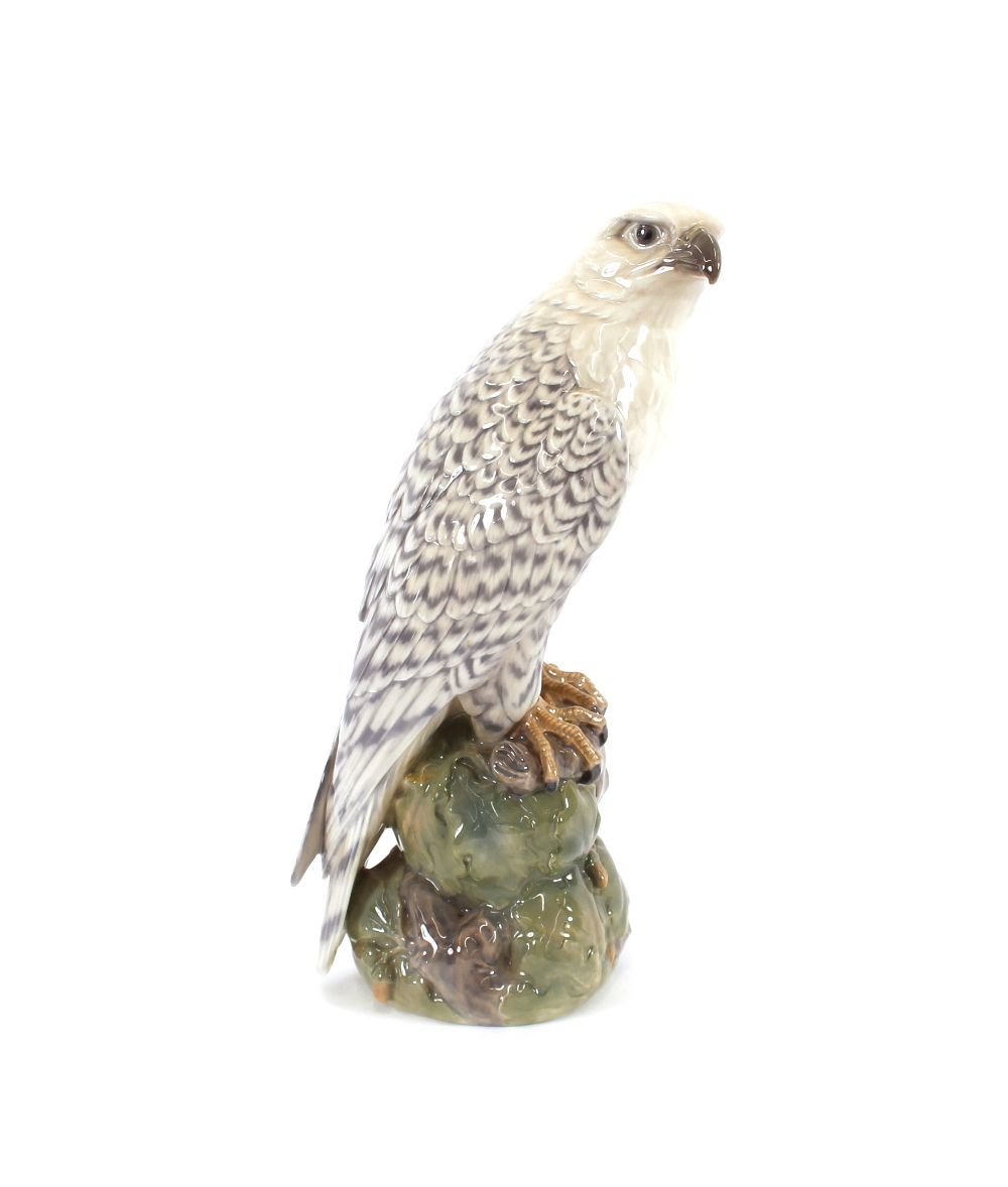 A Royal Copenhagen study of an eagle, perched on a rock, stamped and signed to base, 41cm high