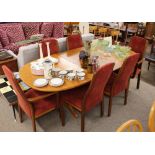 A set of six G plan teak dining chairs; and a similar design extending dining table