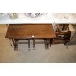 A nest of three mahogany occasional tables and a m