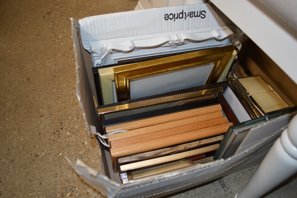 A box of picture frames