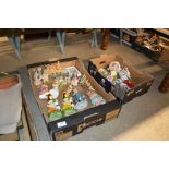 Two boxes of various decorative ornaments and flor
