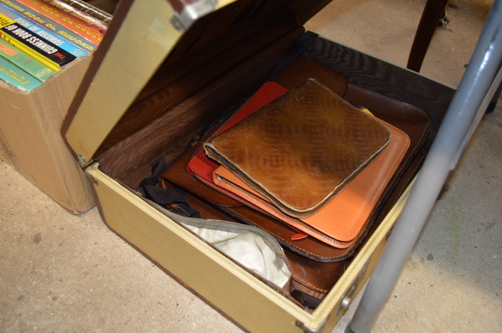 A suitcase together with a brown leather bag etc