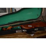 A violin and bow with carrying case