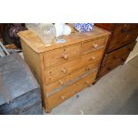 A Victorian stripped pine chest fitted two short o