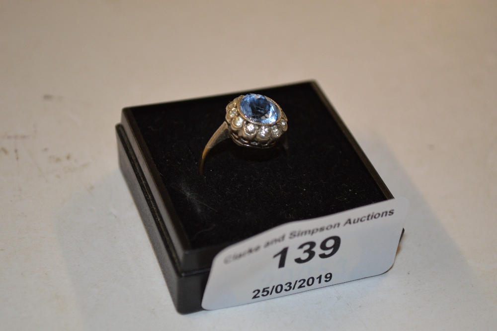 A 9ct gold blue stone set ring