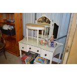 A French style dressing table with mirror and dres