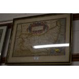 A framed and glazed coloured map of Suffolk 1575