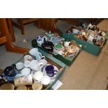 Four boxes of various china mugs and tea pots