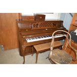 A Kimball mahogany cased piano with oblong stool