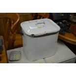 A enamel bread bin and a small enamel soap dish