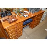 A modern pine dressing table and stool