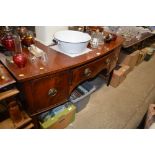 A Georgian mahogany inlaid bow front sideboard (re