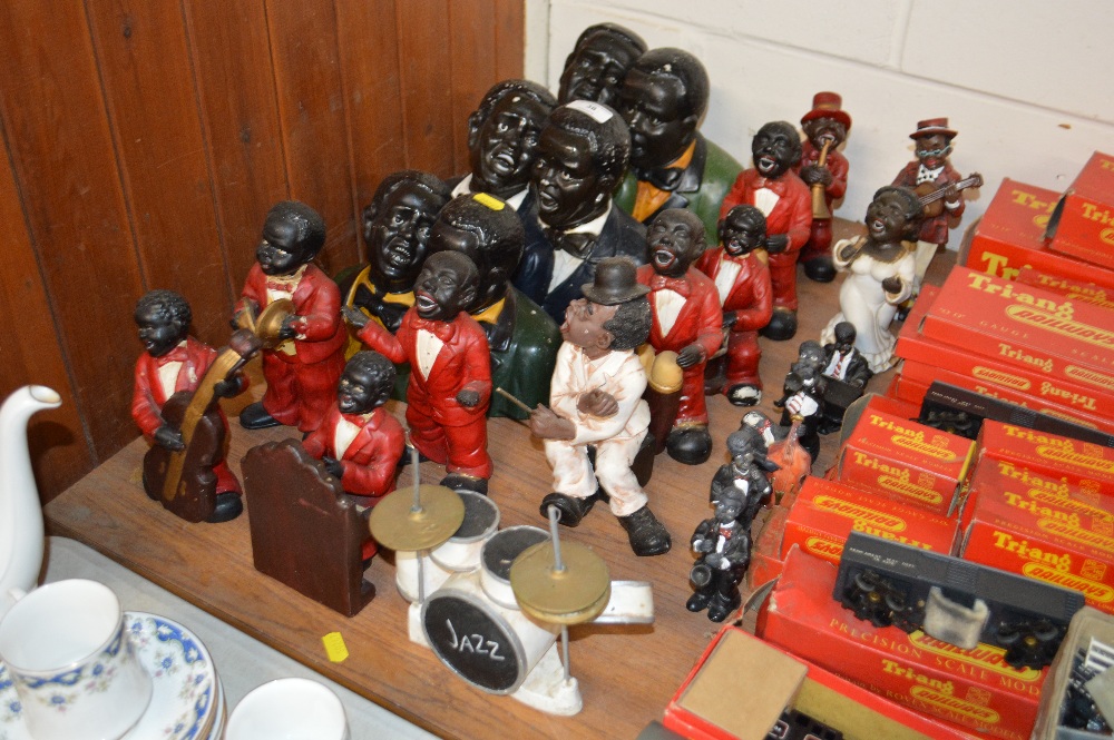 A collection of musical figures and busts