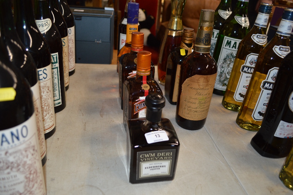 Two bottles of Cointreau; Apricot Brandy liqueur; a