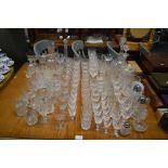 A large quantity of various drinking glasses; two