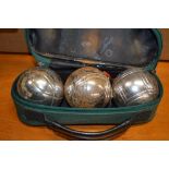 A cased set of three boules