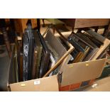 Two boxes of various picture frames