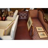 A Victorian mahogany and leather upholstered chais