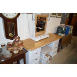 A painted seven drawer dressing table with matchin