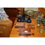 A set of kitchen scales and weights together with