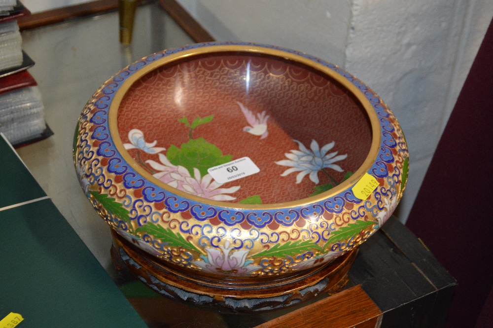 A cloisonné bowl on stand decorated with birds and