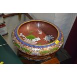 A cloisonné bowl on stand decorated with birds and