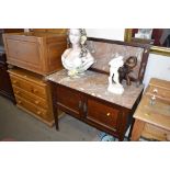 An Edwardian marble topped and back wash stand