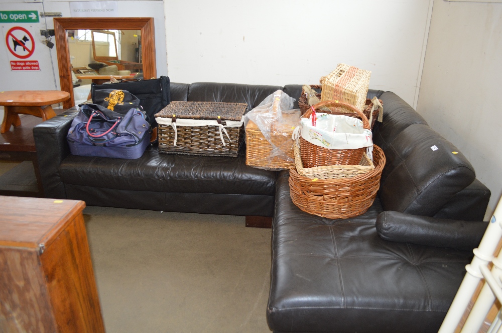 A leather upholstered corner sofa