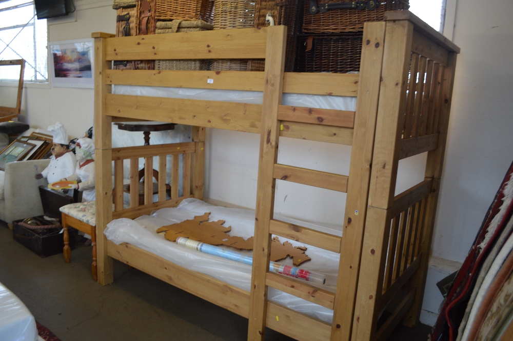 A set of good quality pine Conway bunk beds and mattresse