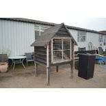 A chicken hut with nesting box