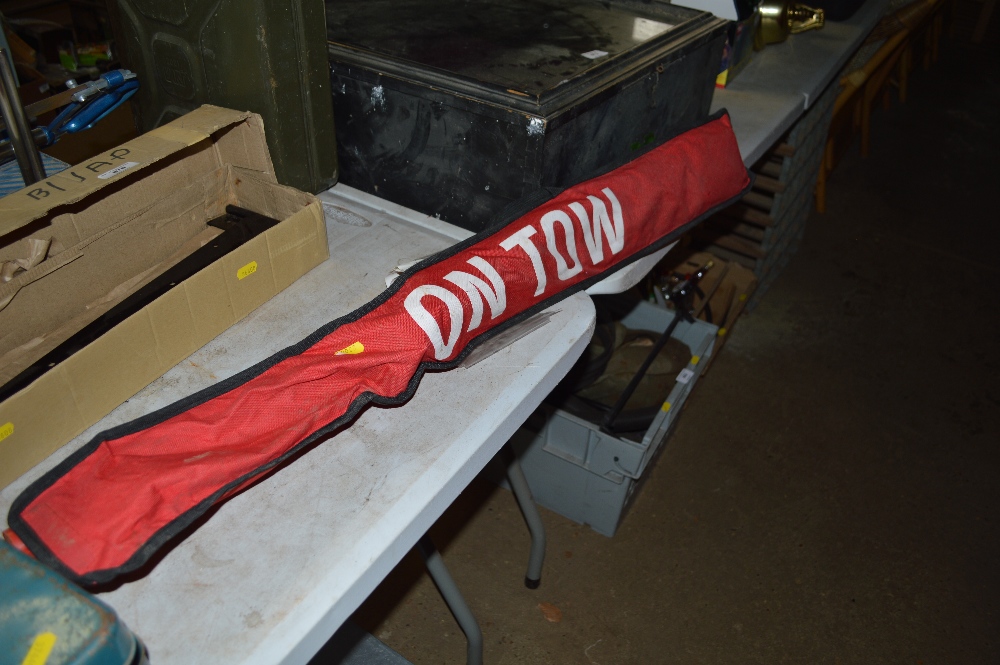 A Hilka ridget steel towing pole with dampening sp