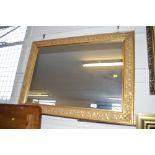 A gilt framed oblong wall mirror