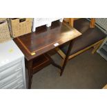 An Edwardian mahogany two tier coffee table