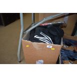 A box of sporting clothing