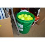 A bucket of Slazenger tennis balls
