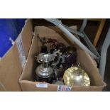 A box of various trophies