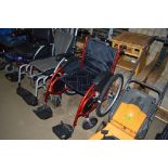 A Red all terrain wheel chair (as new)