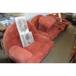 Four red floral upholstered arm chairs and two pou