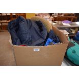 A box of various golf jackets etc.